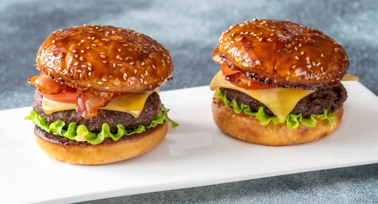 Two hamburgers on the plate close up